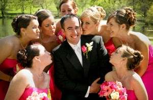8-wedding-traditions-from-around-the-world-denmark-bridesmaids-kissing-the-groom_630x412